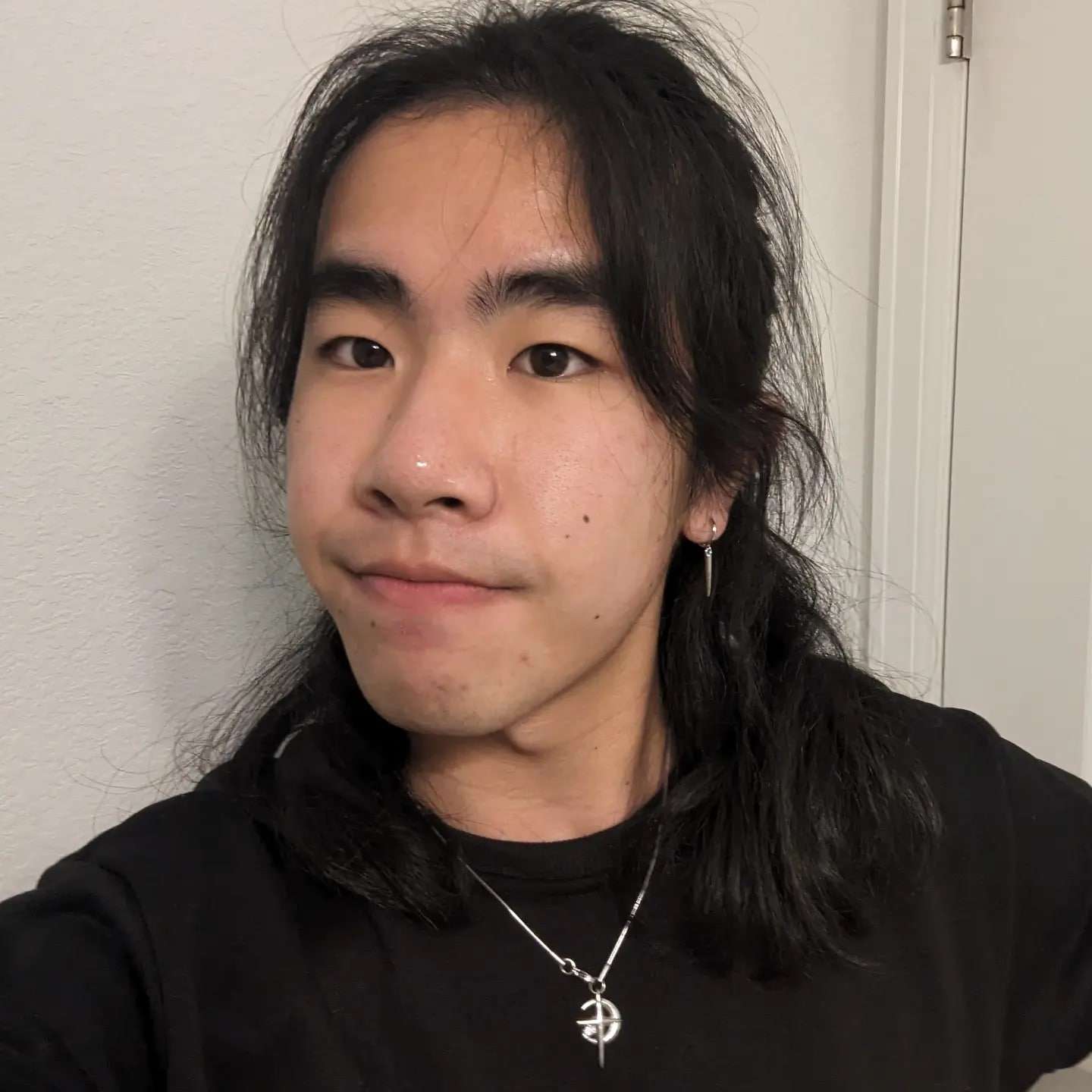 Chirs headshot smiling with casual clothes